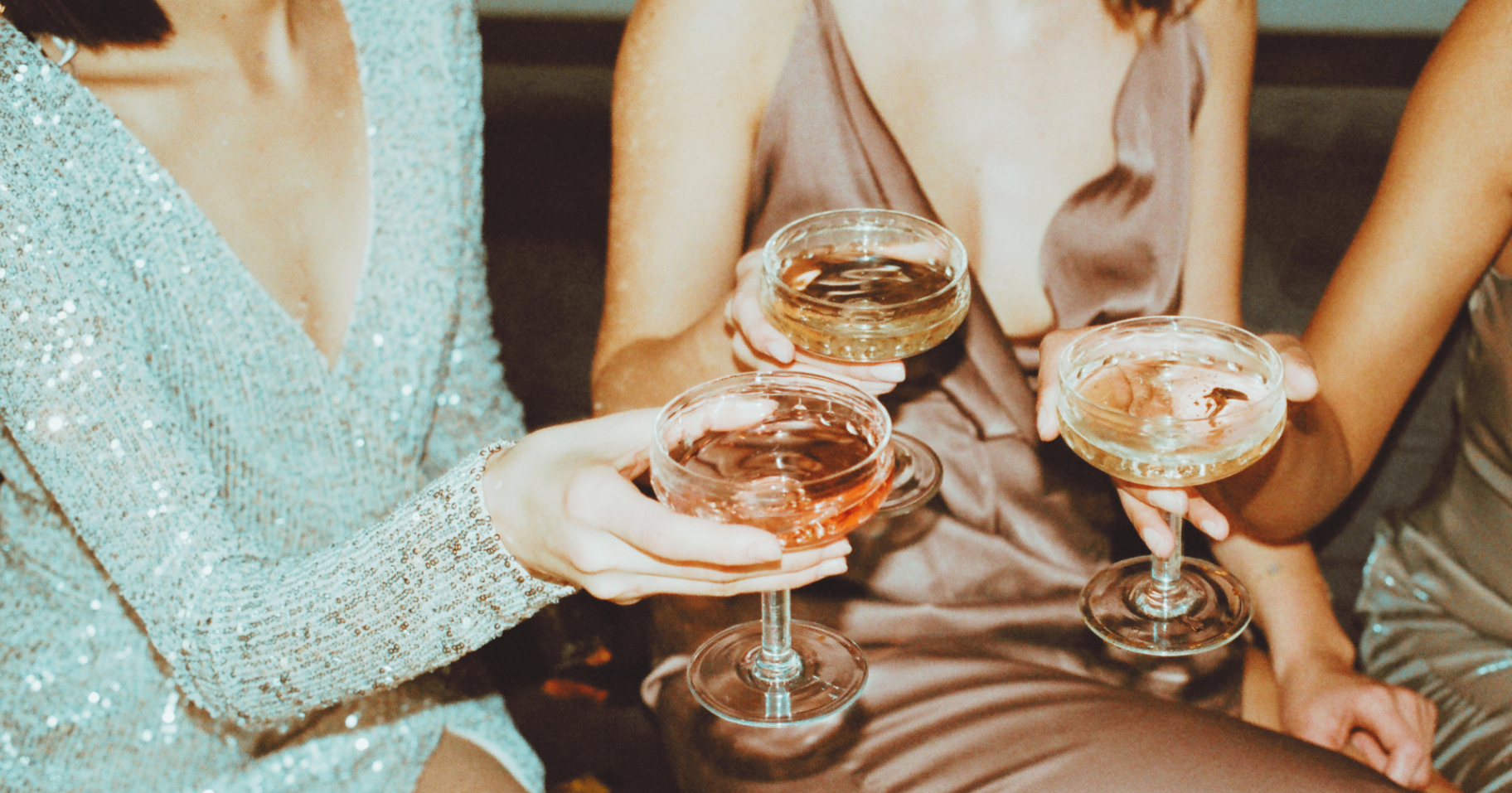 Coupes raised in a celebratory toast